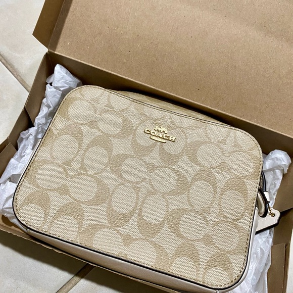 Coach Handbags - Coach Cream Signature Crossbody Bag